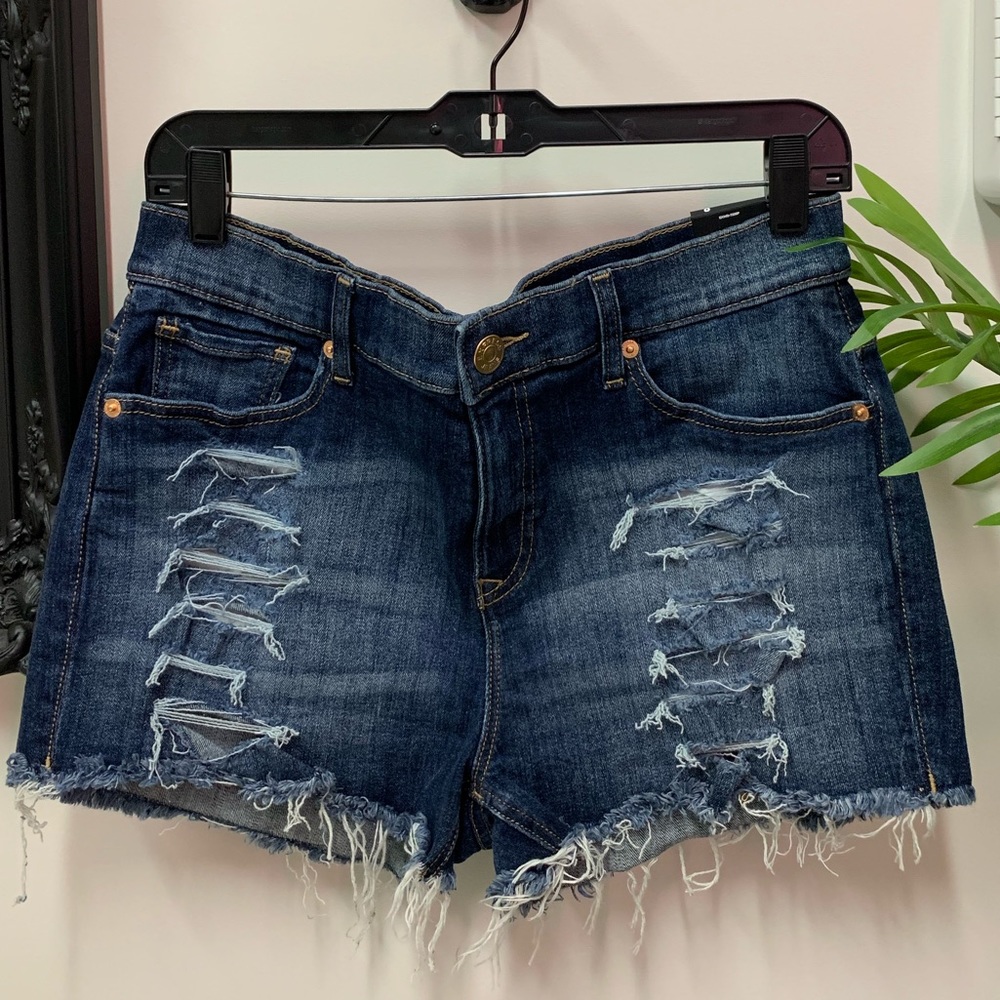 High rise distressed denim shorts